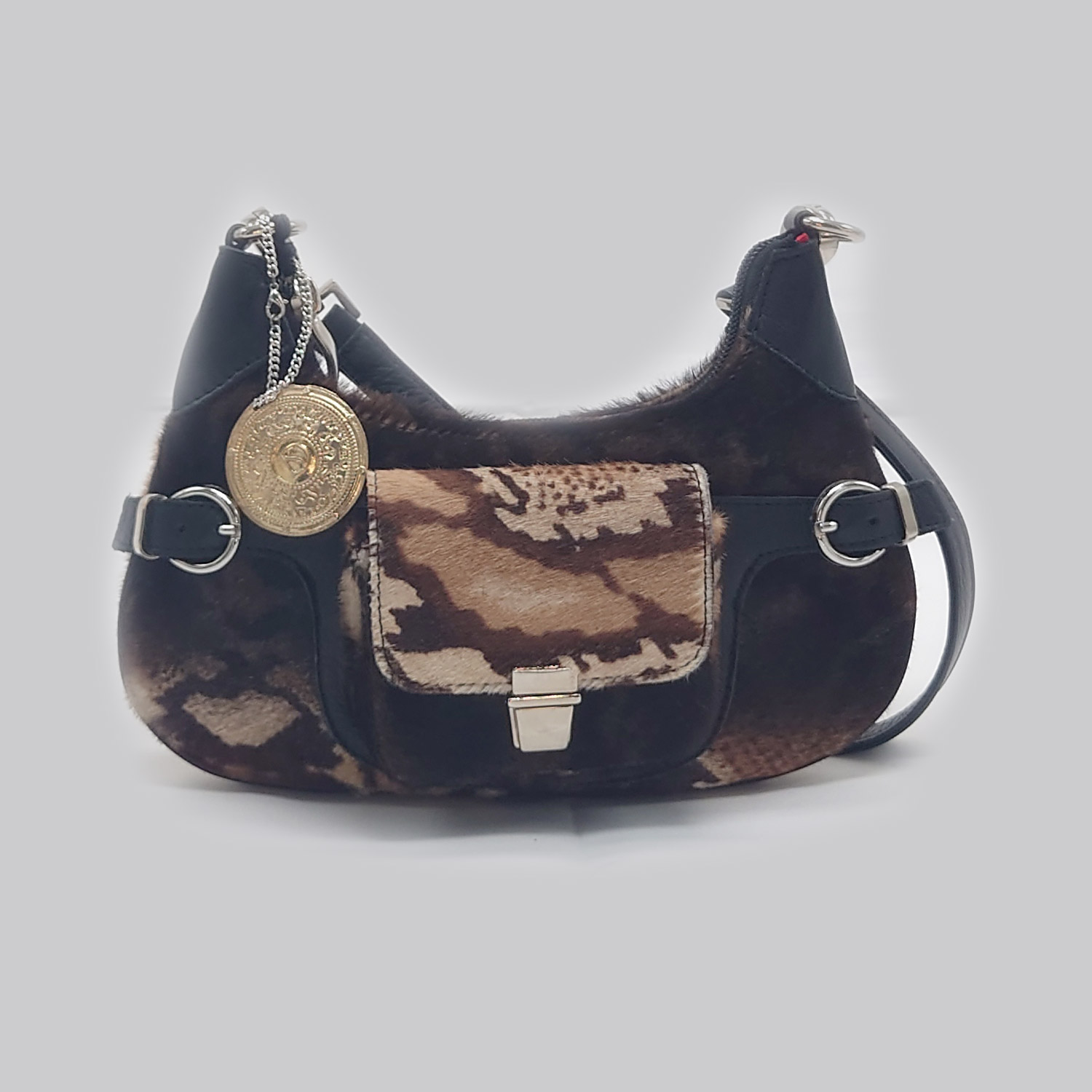 Borsa marrone e ocra in pelle di mucca animalier